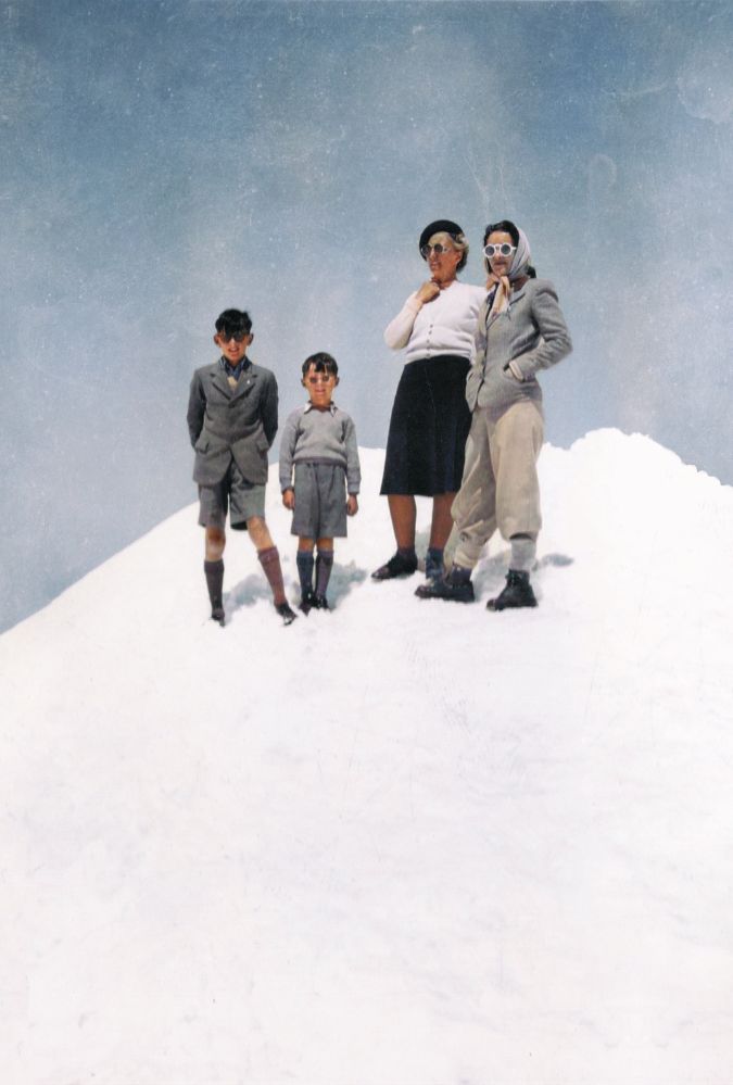 Image shows two children and two adults standing side by side on a white patterned floor. Around them is blue, which gives the impression that they stand on a white mountain top. Credit- BOFA Productions