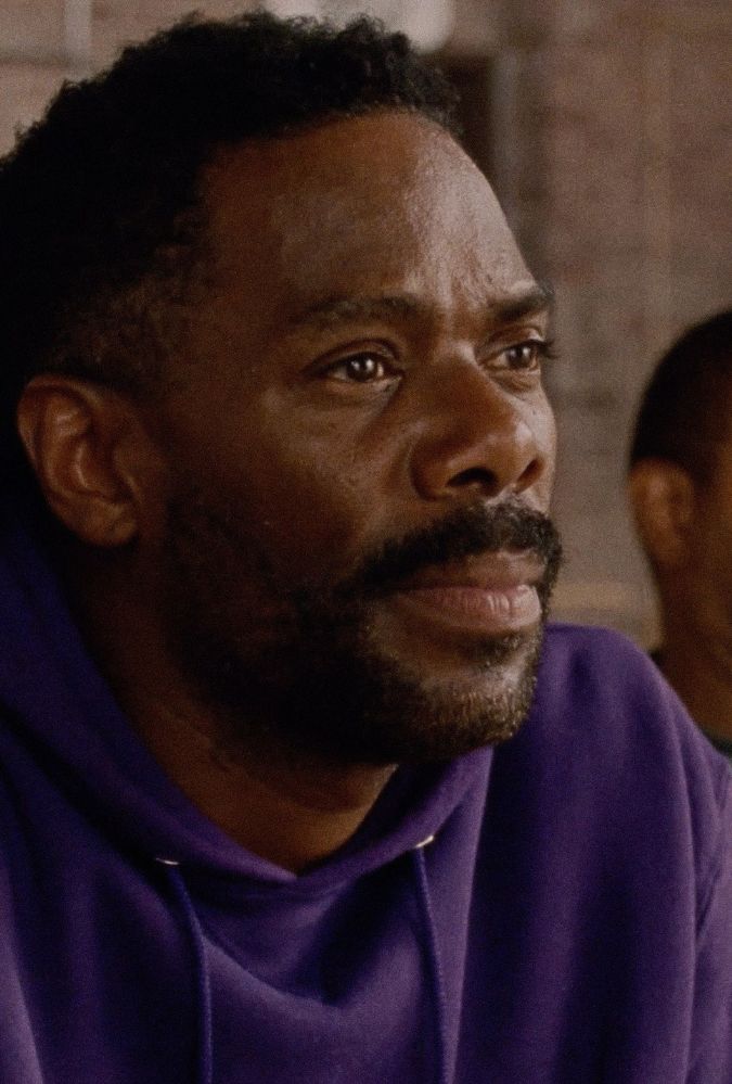 Still from Sing Sing, showing a close up of Colman Domingo, who wears a purple hoodie. Courtesy of EIFF